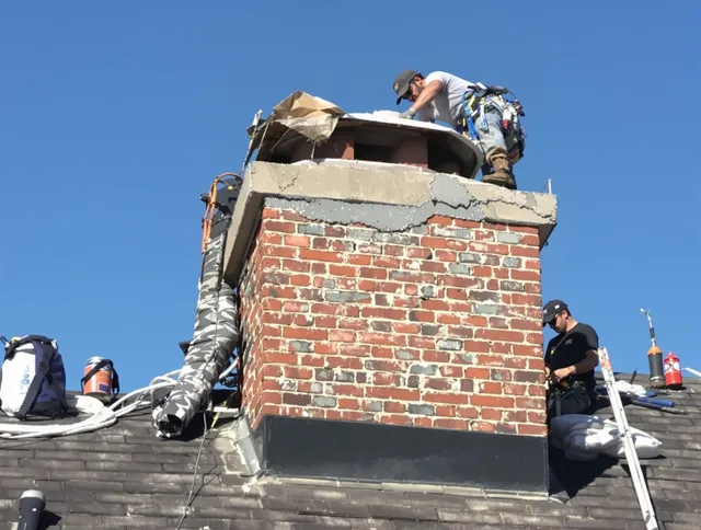 West Whittier-Los Nietos Chimney Sweep installing a custom chimney crown in West Whittier-Los Nietos, CA